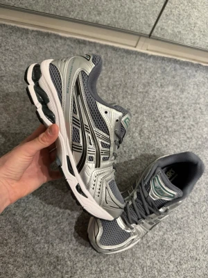 Asics gray/silver shoes 44 - Size 44, true to size. Very comfortable and soft. Brand new, never worn outside. 
