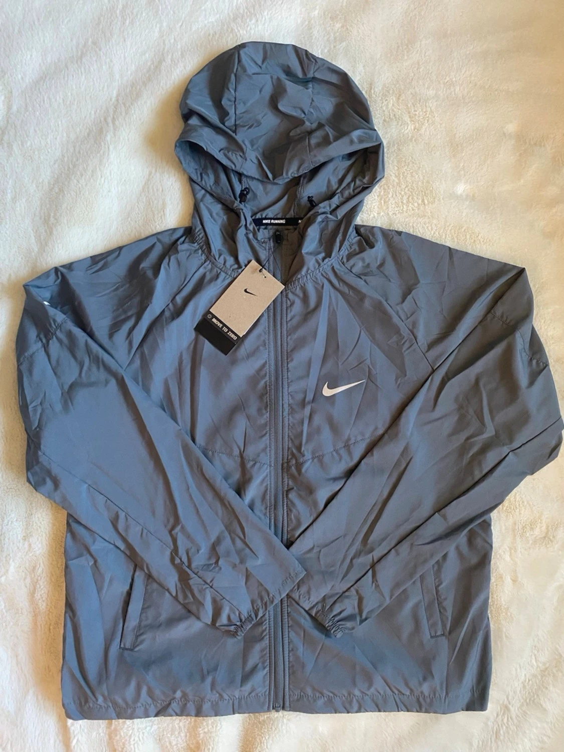 Nike grå vindjacka med huva