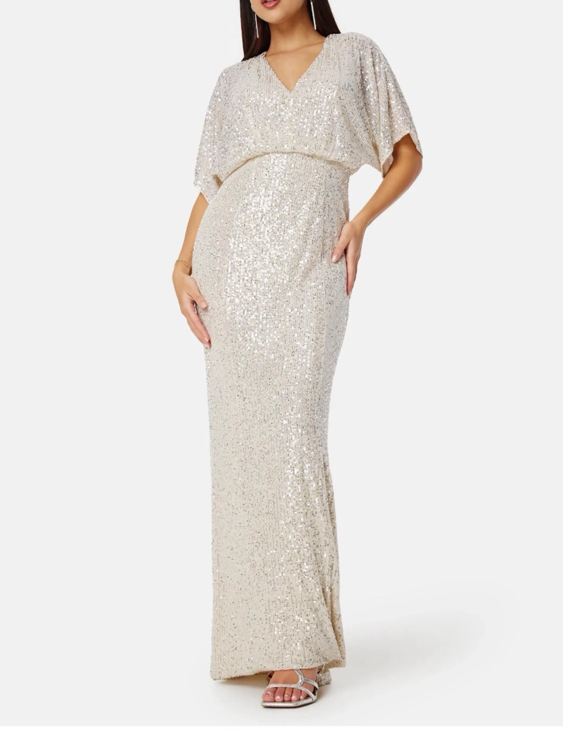 Glittrig långklänning med öppen rygg - 1