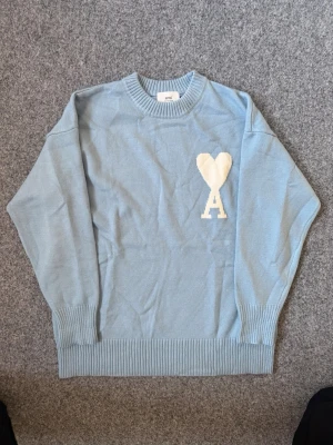 Ami light blue/ baby blue knit sweater - Size M. true to size, very comfy and fits nice. Questions DM