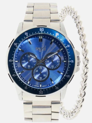 Regal silverfärgad klocka blå urtavla - Stilren klocka från Regal med silverfärgad länkarmband och en blå urtavla med flera subdials. Klockan har en rund form och detaljer i silver, vilket ger en modern och fräsch look. Perfekt accessoar för dig som vill sticka ut.