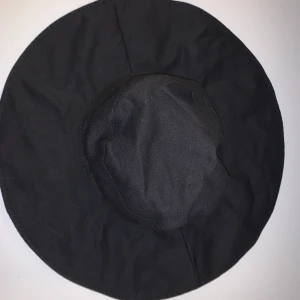 Slokhatt - Svart slokhatt 