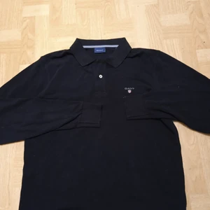 GANT piké långärmad - Långärmad piké storlek medium.