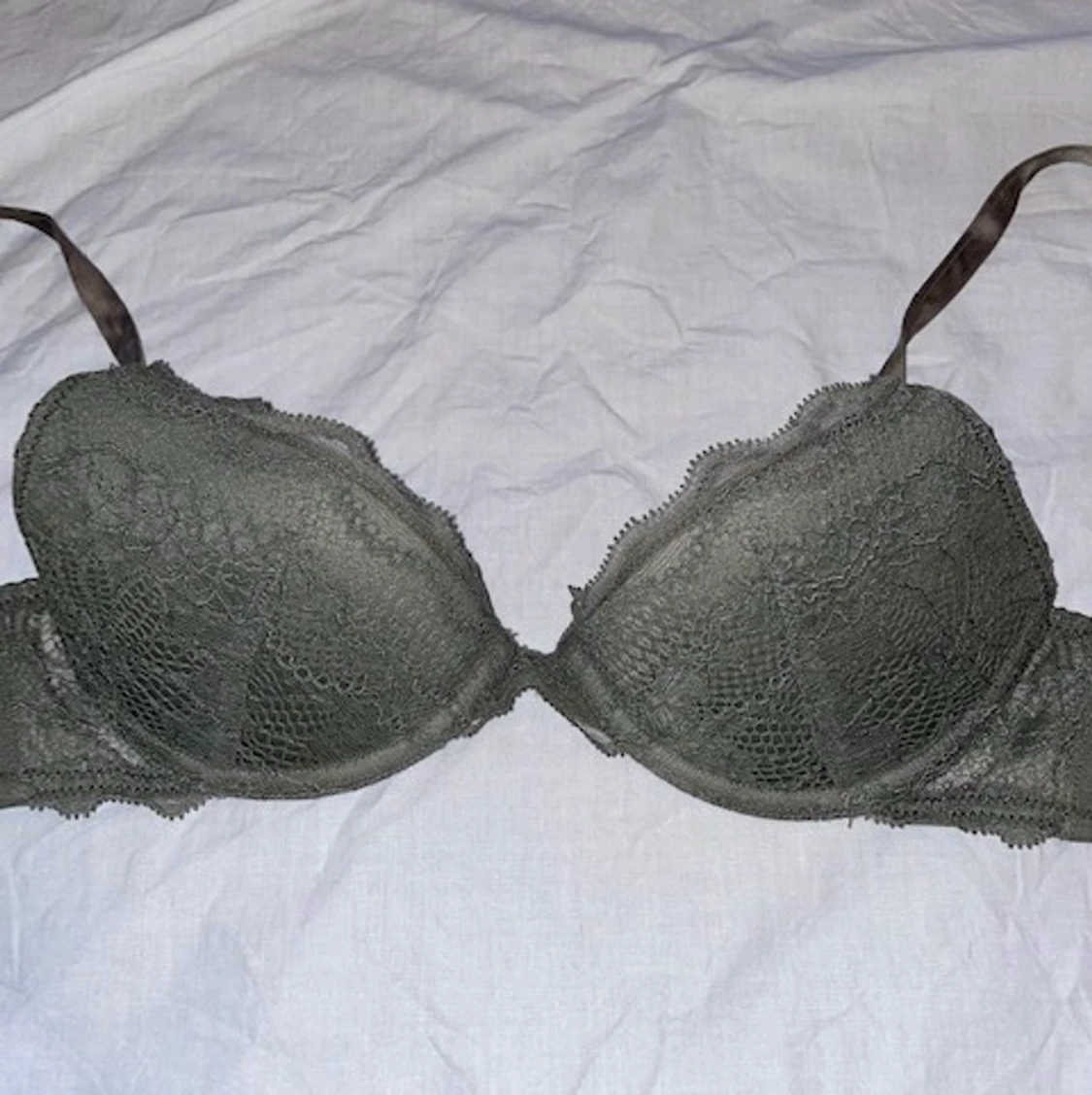 Mörkgrön bh med rosa rosetter - 90