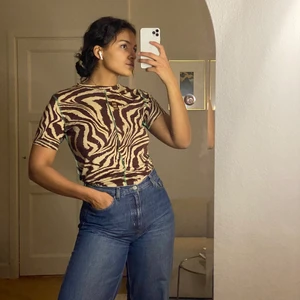 T-shirt från Ganni storlek M - Skickas endast -köparen står för frakt.  För referens är min längd 174 cm.