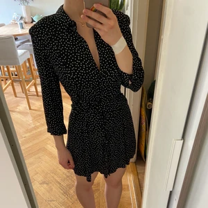 Mango Dotted Dress  - Button up Dress. Worn only twice, so in great condition. It is a size large but feels more like a medium. Shipping not included 