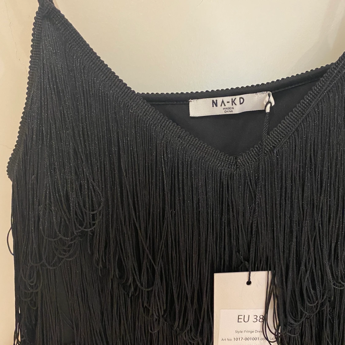 Svart klänning med fransar  - 90