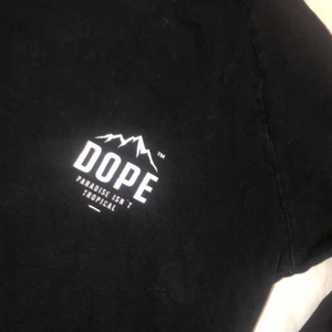 Dope tröja  - Sprickor i märket 