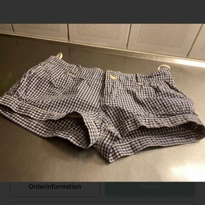 Ralph Lauren Polo jeans shorts i strl 26 - Ralph Lauren Polo jeans shorts. Storlek 26, vit / blå rutiga.100 % bomull. 