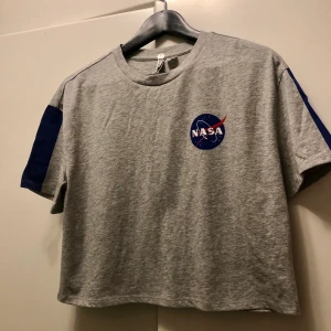 Nasa Top - Never worn, completely new. Loose size S