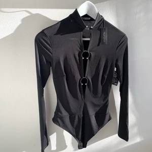 Oanvänd! - Oanvänd body från Nelly med prislapp kvar. Storlek xs 💕