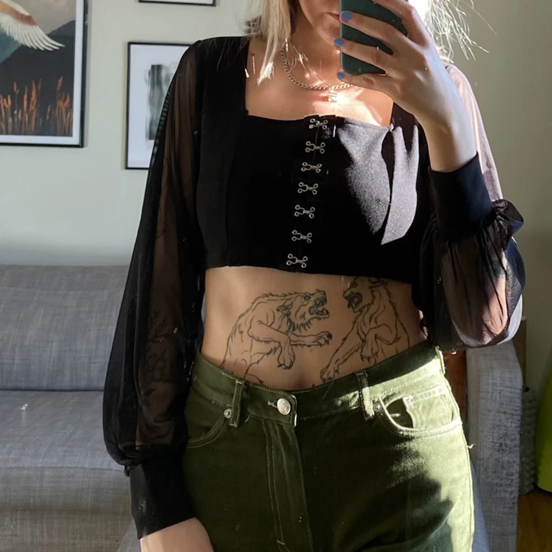 Svart topp med mesh armar  - 90