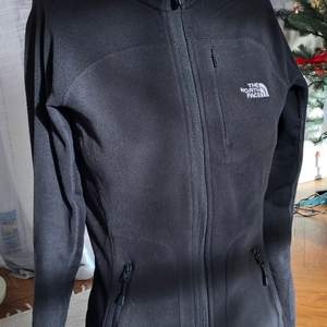 women's Polar the north face fleece size XS with zip and thermal technology.  Comfortable pockets.