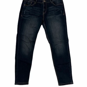 Dark blue jeans  - This jeans are very comfy and stretchy. They don’t have a brand. 
