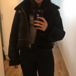 Eco-leather jacket - Short and Stylish. Can even wear during rain and snow. Like a new. Shipping available.