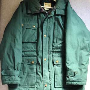 Green winter jacket, size M Bought second hand, never worn myself.