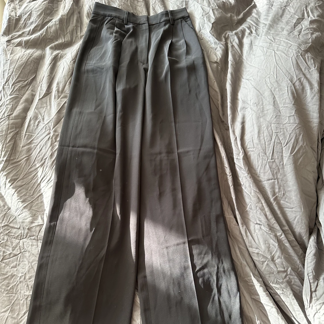 Svarta kostymbyxor  - 91