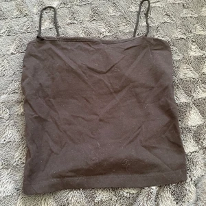 Gina linne  - Ett croppat svart linne som har blivit för liten den är från Gina säljer för 50 +frakt 