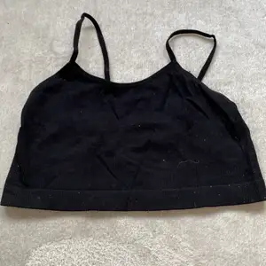 En svart topp tröja från Lindex i storlek s
