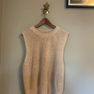 Väst - Stickad väst storlek L