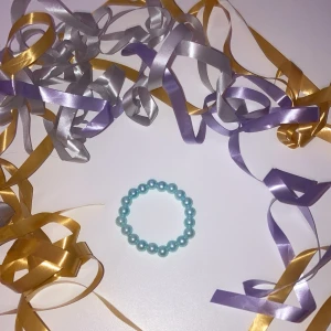 10kr - Ett blåt armband 10kr