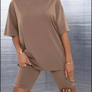 Brunt set cykelbyxor och T-shirt  - Helt oanvänd och ny, passade inte mig