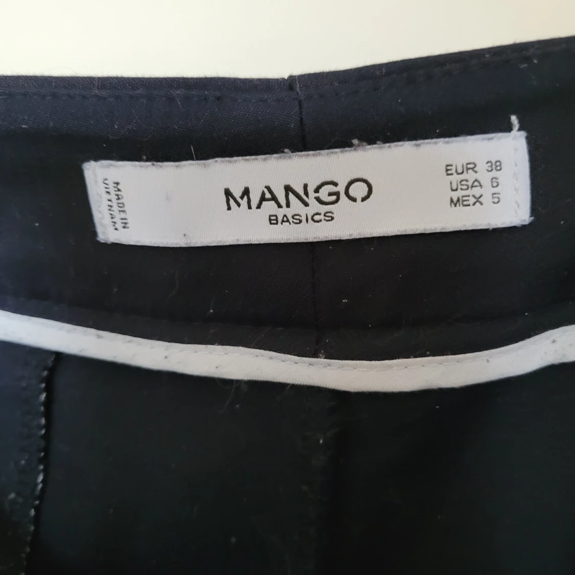 Mörkblåa byxor - 91