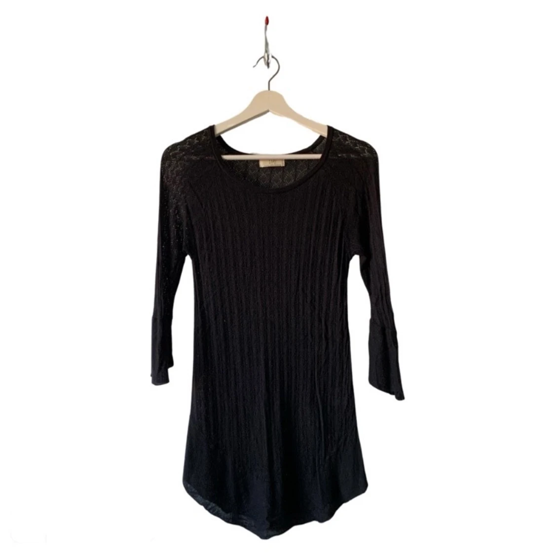 Svart långärmad tröja.