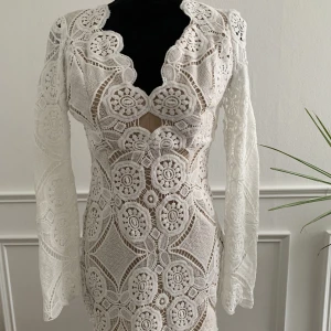 Klänning  - En klänning som passar till studenten/examen, men även till vardags. 