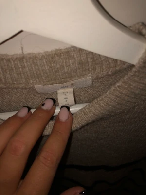 Stickad tröja  - Hm 