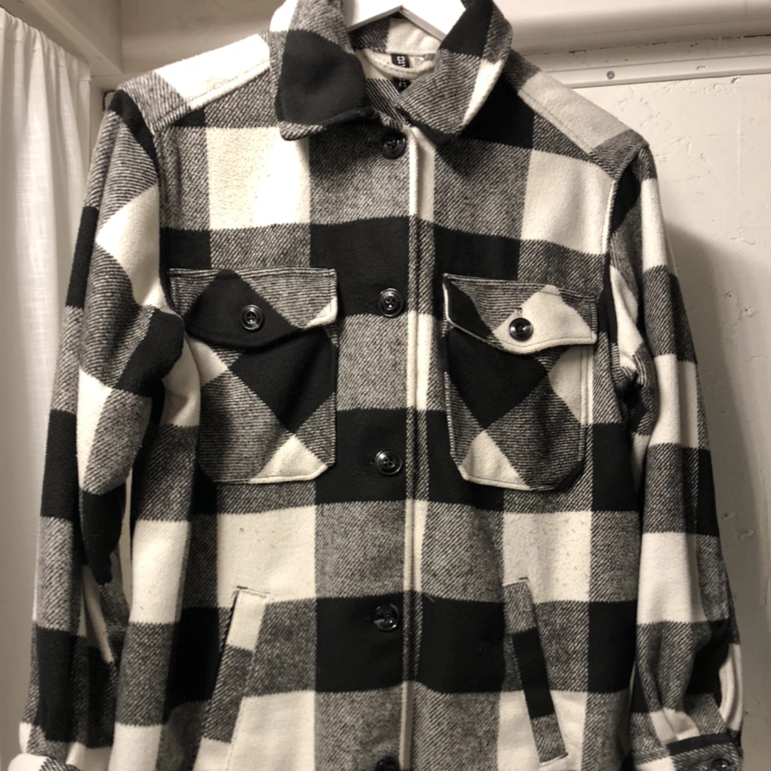 Svart/vit rutig kappa