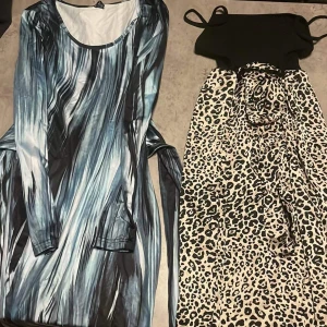 Klänningar - Blå klänning oanvänd  100kr Leopard klänning oanvänd 80kr