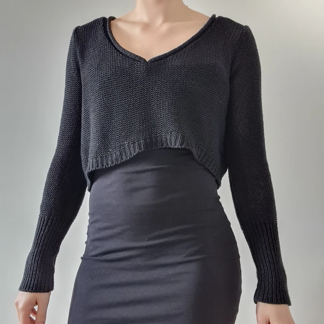 V-ringad stickad långärmad magtröja