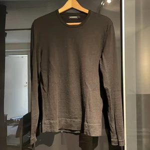 J.Lindeberg slim-fit merinoullströja i S - Svart merinoullströja från J.Lindberg i Slim-fit. Bra skick