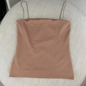 Nude crop top from New Yorker. Size xxs but fits xs as well 