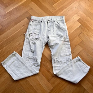 Ralph Lauren Jeans - Distressed Ralph Lauren denim & supply jeans (är lite distressed mellan benen så man vet)  Ljusblå nästan vita