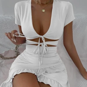 Vit sommarklänning  - Använd endast en gång !, storlek S, stretchig material 