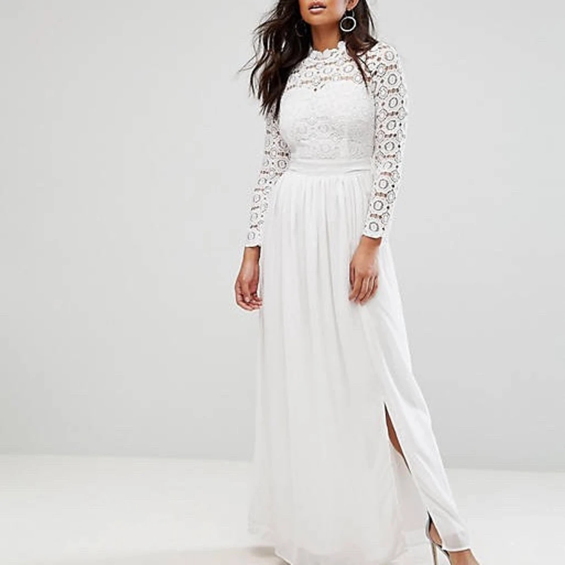 Virkat maxiklänning med svart material