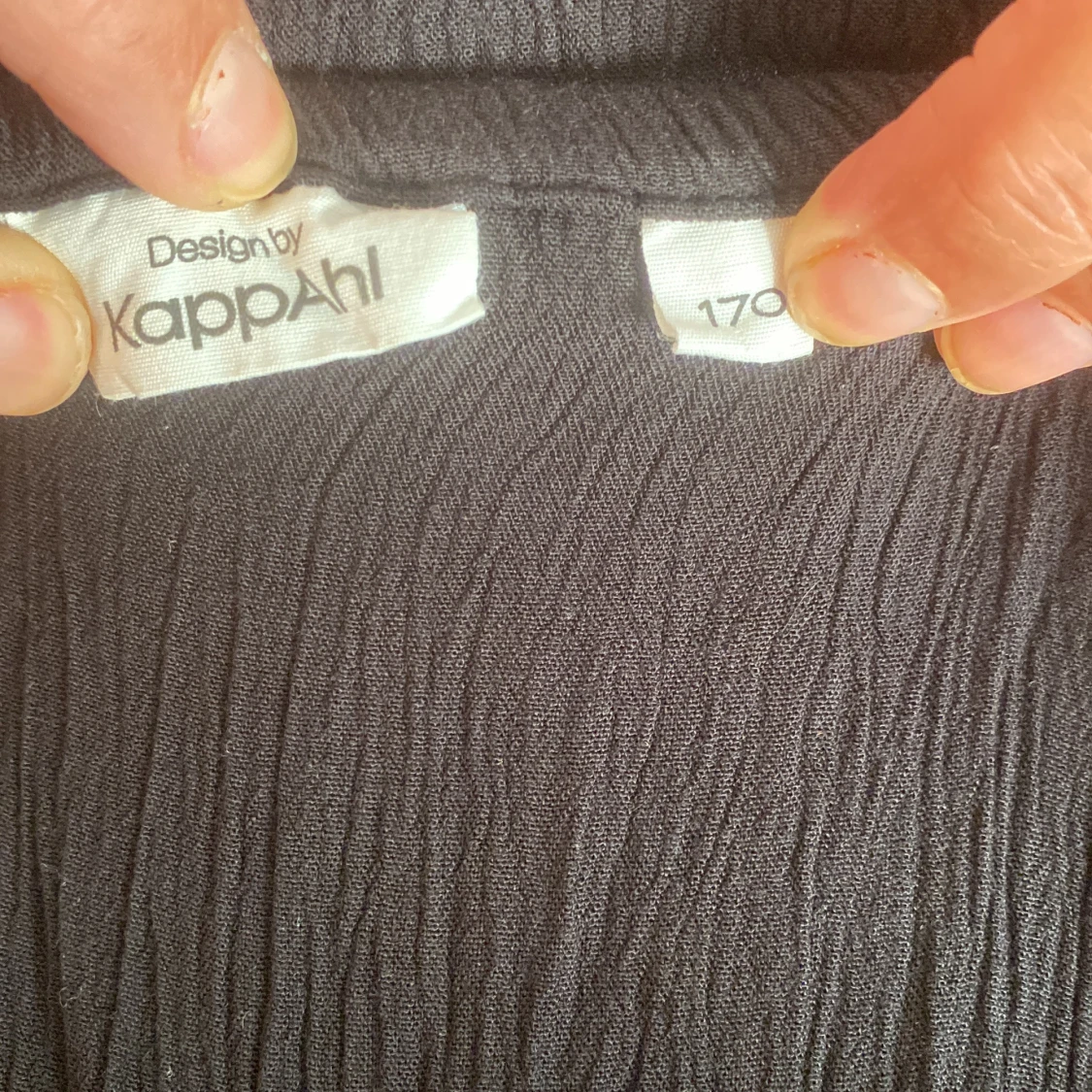 En svart jumpsuit - 91