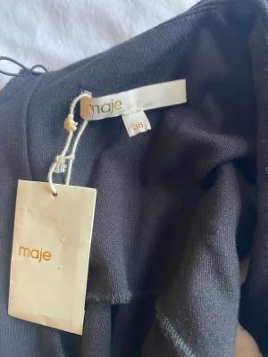 Black mini dress  - Selling this new dress from Maje never worn with tags is a bit short on me. 