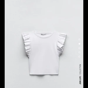 volangtopp  - Ny volangtopp från zara i storlek S. Andvänd 1 gång, pris kan diskuteras 