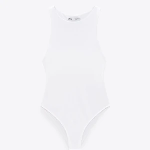 Body - Säljer oanvänd body från zara. Lapp sitter fortfarande på