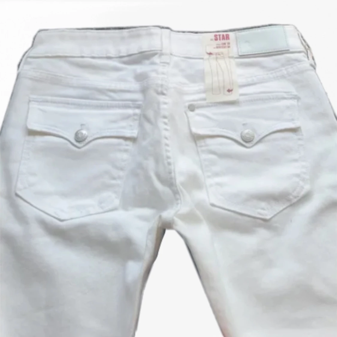 lågmidjade vita jeans - 90