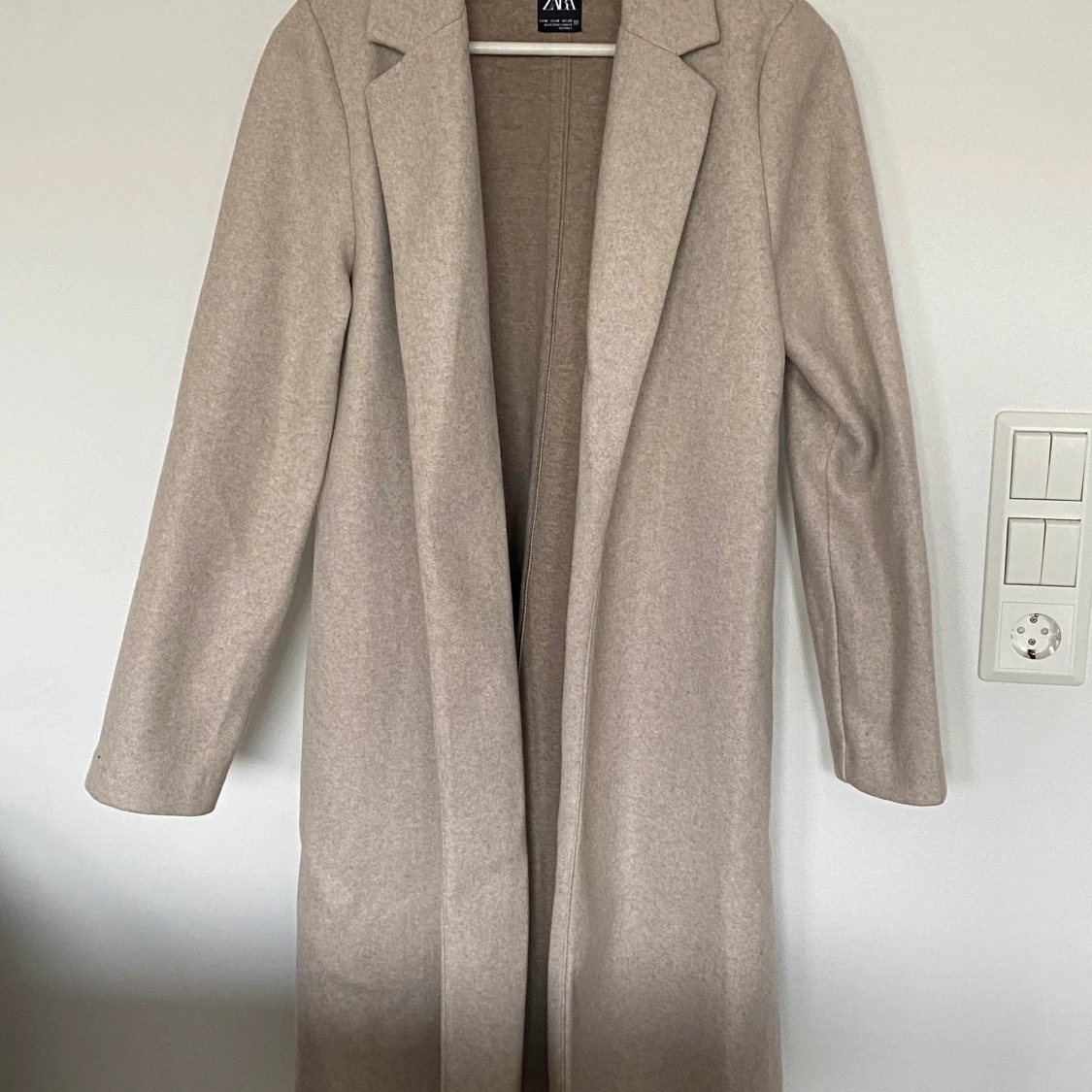 Beige kappa från Zara