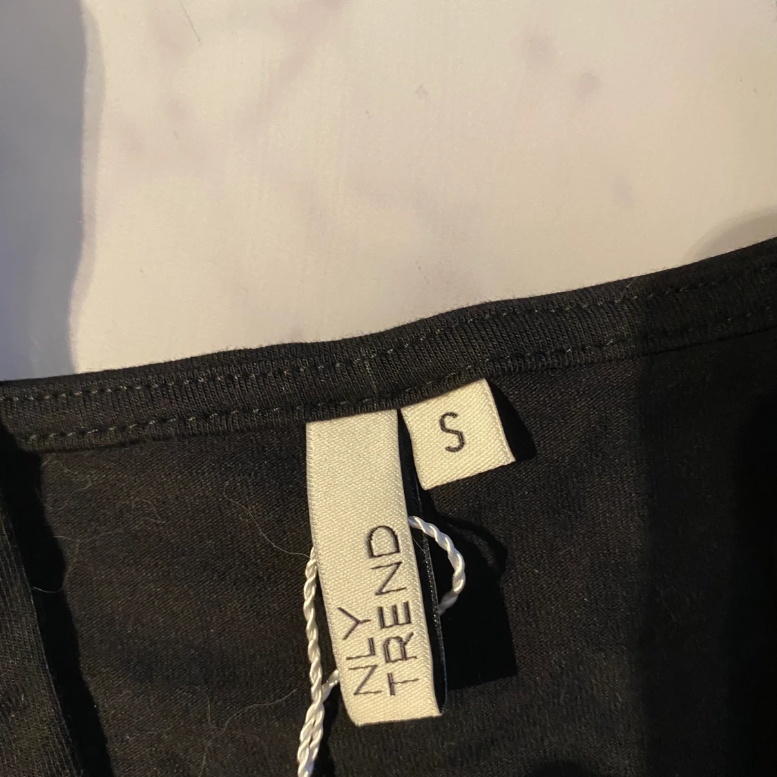 Helt ny topp från Nelly  - 91