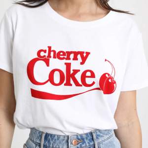 t shirt med tryck av coca cola märket från H&M, i nyskick