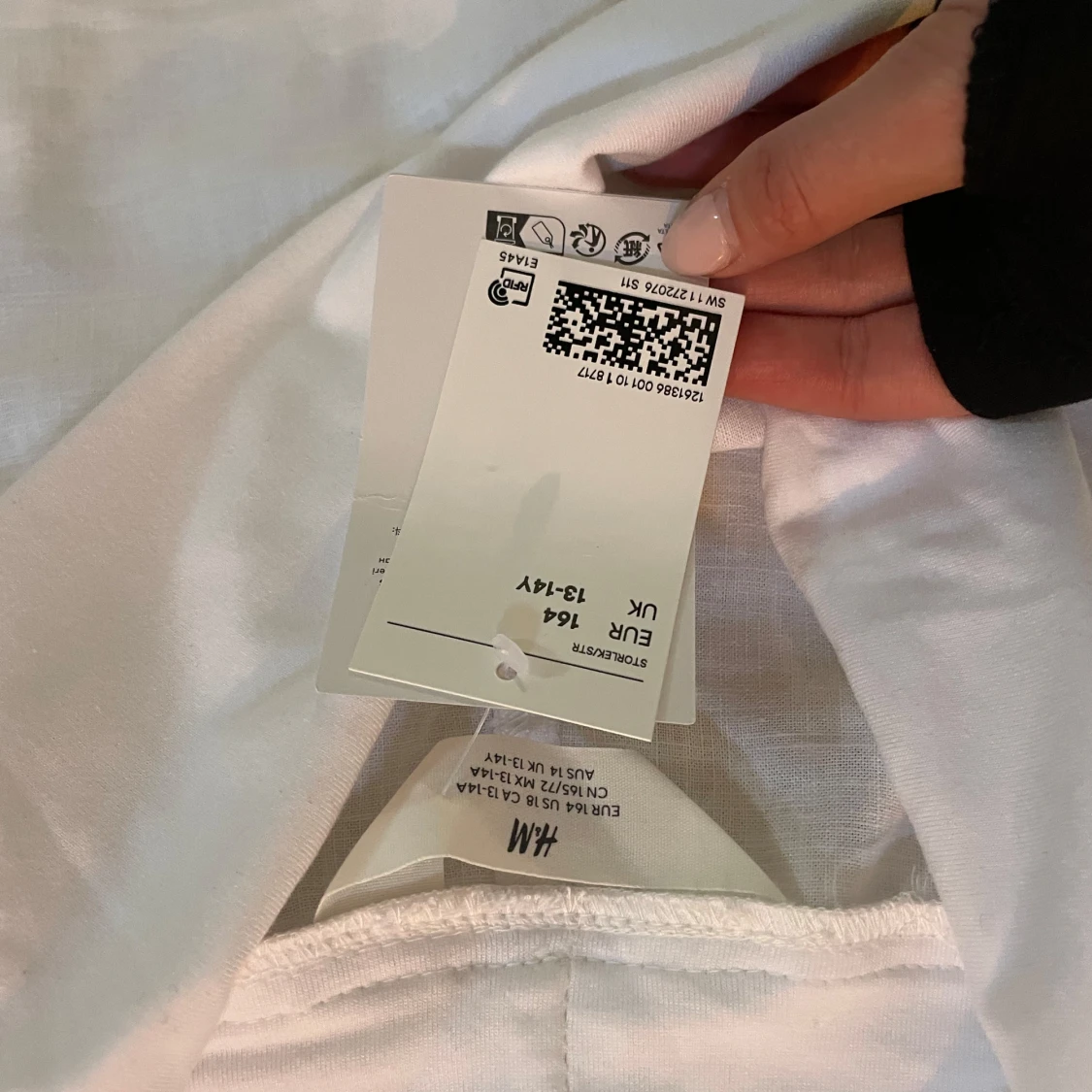 Vita utsvängda linnebyxor från H&M - 1