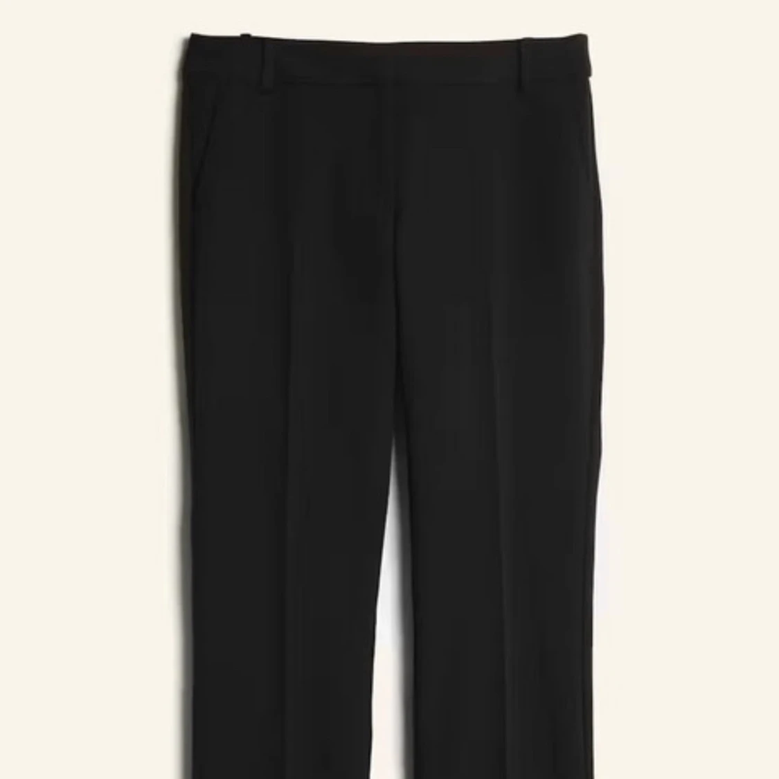Svarta kostymbyxor