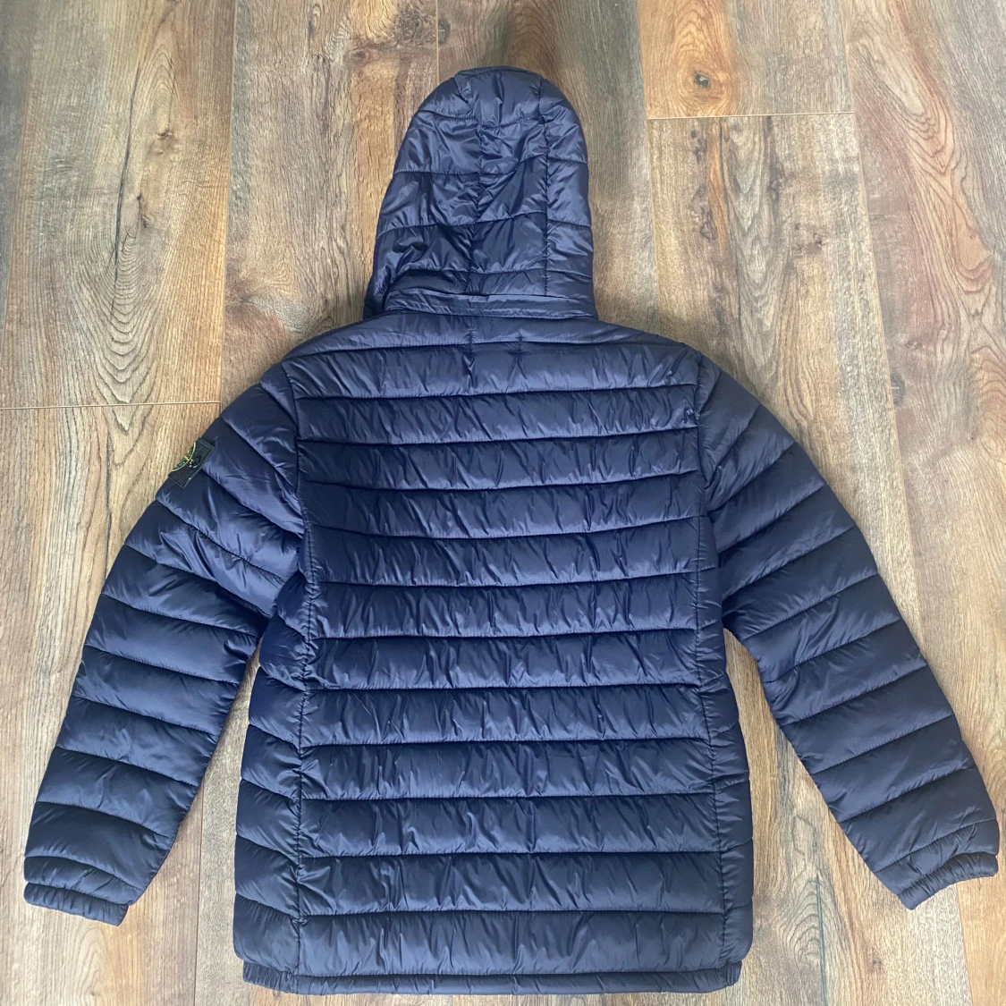 Mörkblå dunjacka från Stone Island - 1