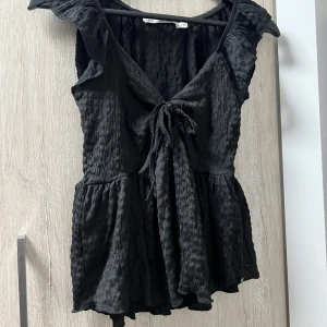 svart tröja  - aldrig använd